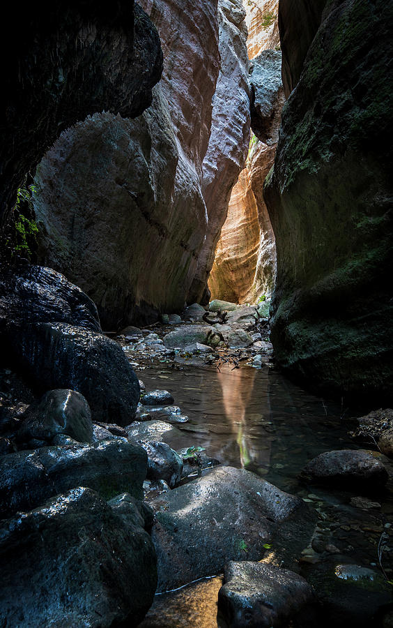 Bright Light Through The Rocks Photograph