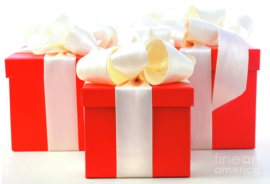 Christmas Photograph - Bright red festive gift boxes by Milleflore Images