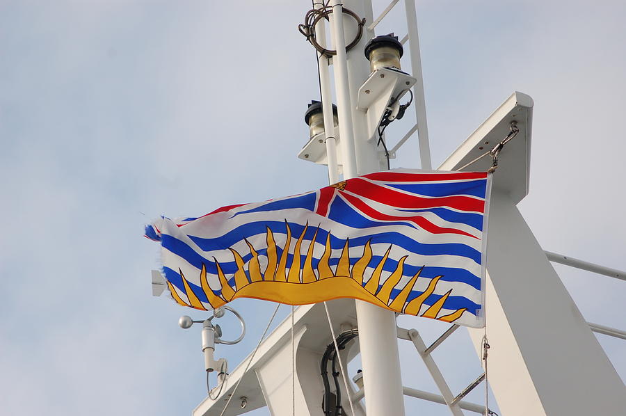 British Columbia Flag Blowing Photograph by James Cousineau