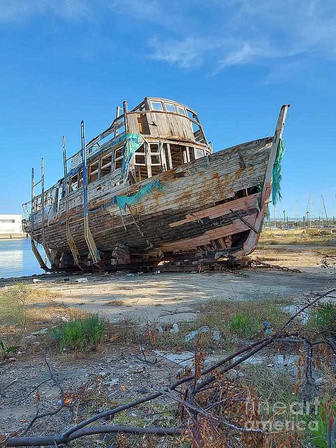Broken ship in El Puerto Photograph by Chani Demuijlder