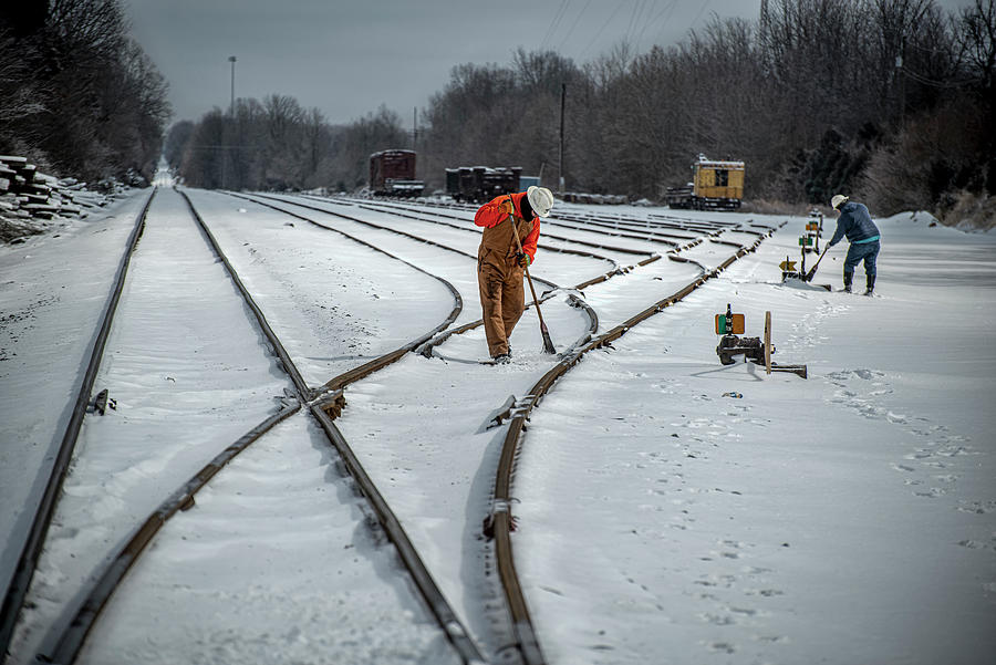 Broom work is never done after a good snow on the PAL Photograph by Jim Pearson