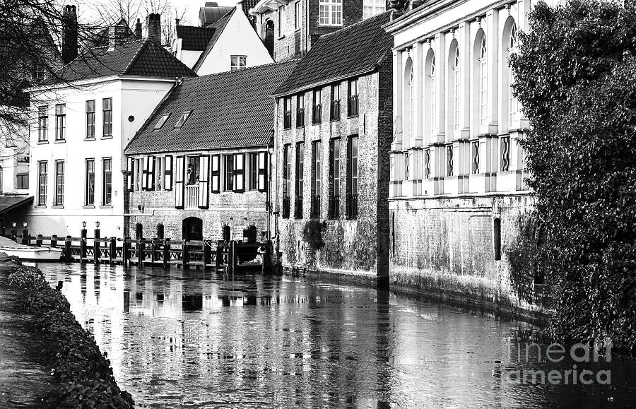 Icy Water on the Bruges Canal Photograph by John Rizzuto