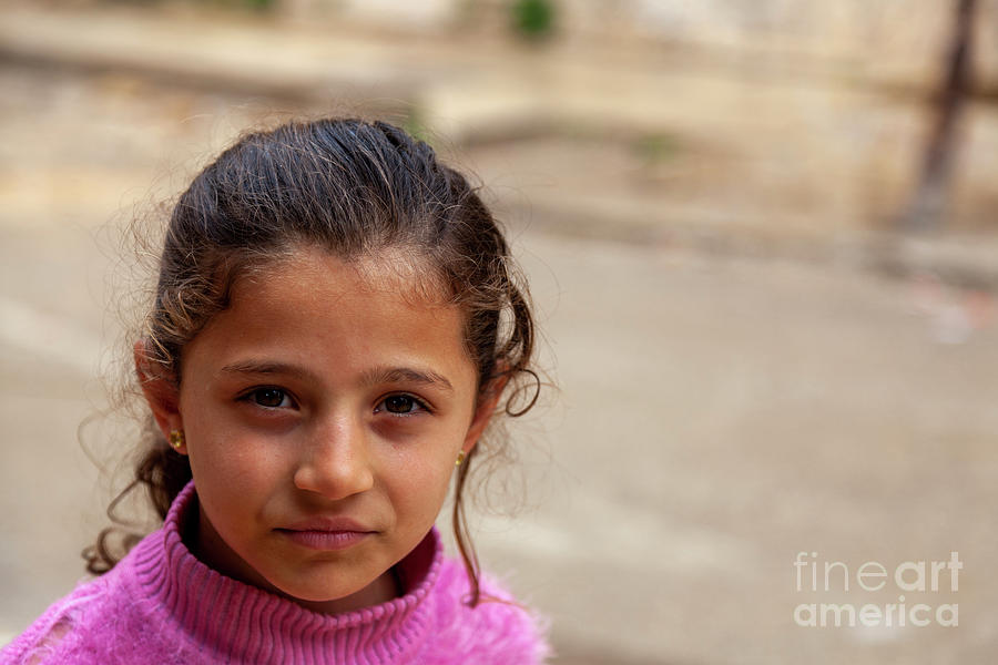 brunette Syrian girl at a poor neighborhood in Tartus Photograph by ...