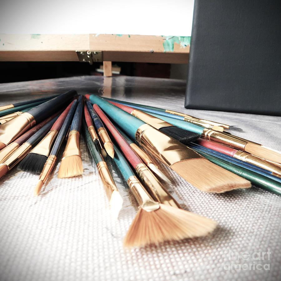 Brushes and Little Black Canvas Photograph by Stefania Caracciolo
