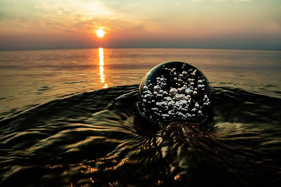 Bubbles Lens ball at sun rise Photograph by Sven Brogren