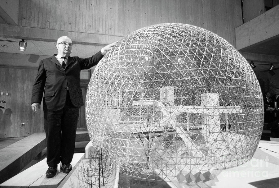 Buckminster Fuller with a model of the biosphere for the Canadia Photograph by The Harrington Collection