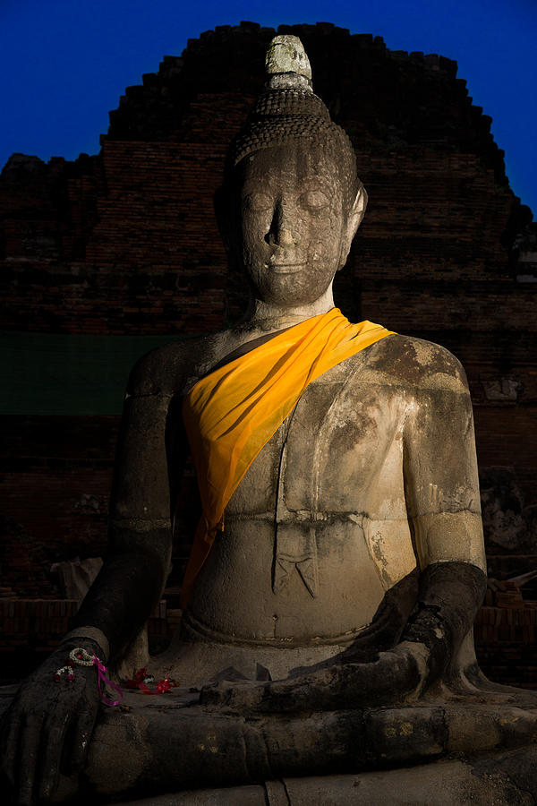 Buddha Image sitting silently in the dark Photograph by Lifeispixels