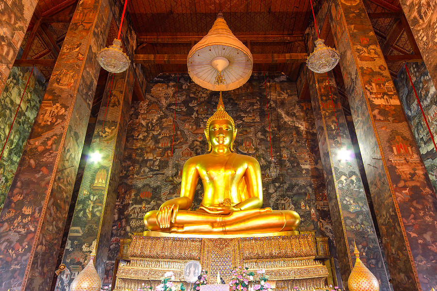 Buddha Statue in Wat Suthat Thep Wararam. Photograph by Pakin Songmor