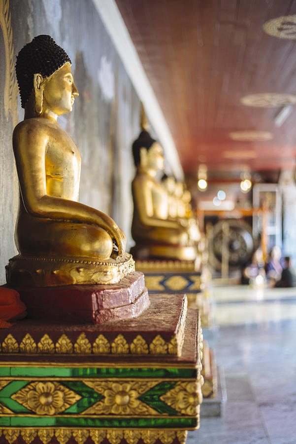 Buddha statues in Doi Suthep temple. Photograph by Micaelnuss
