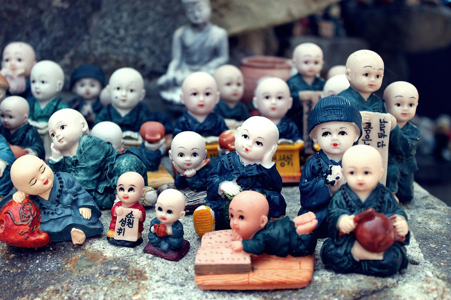Buddhist dolls Photograph by Michael Em