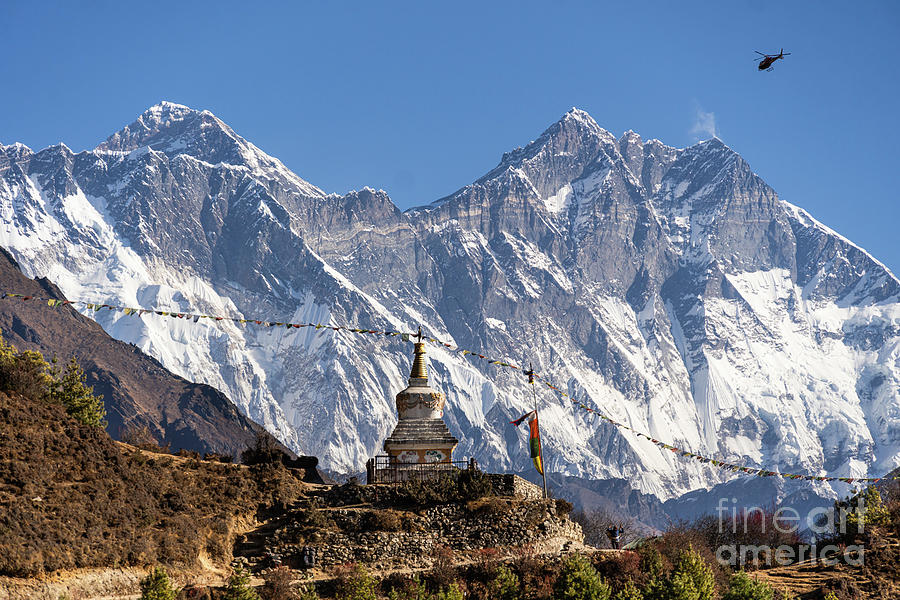 Buddhist stupa along the hiking trail in the Khumbu valley with  Photograph by Didier Marti