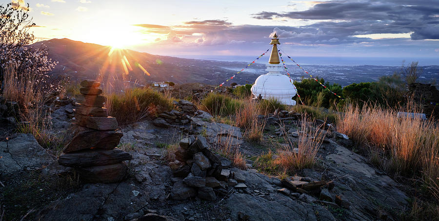 Buddhist sunrise Photograph by Gary Browne