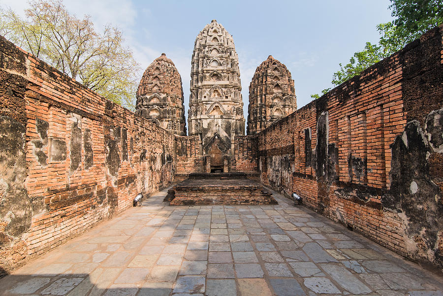 Buddhist temple in the historical site of Sukhothai (Wat Si Sawai Temple), Thailand Photograph by Yanis Ourabah