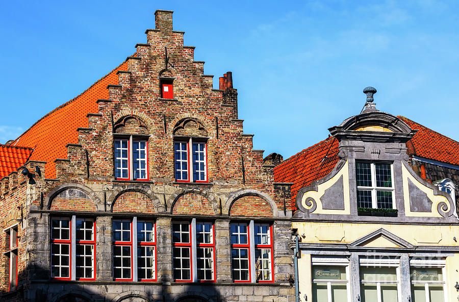 Building Tops in Bruges Belgium Photograph by John Rizzuto