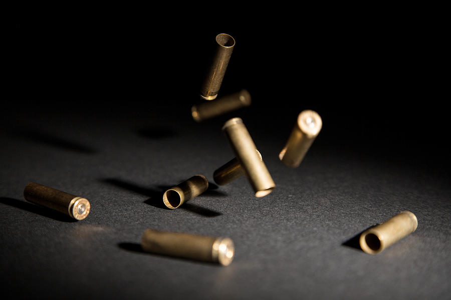 Bullets Falling on Ground Photograph by Yuichiro Chino