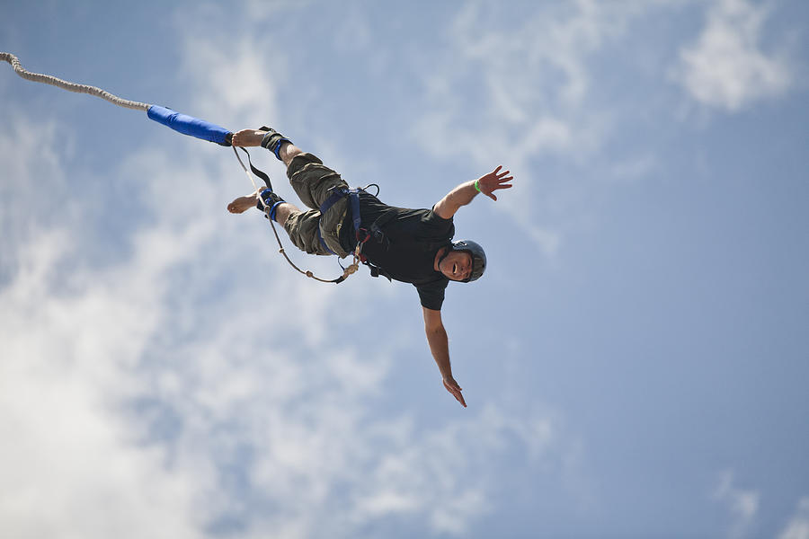 Bungee jumping man Photograph by Image taken by Mayte Torres