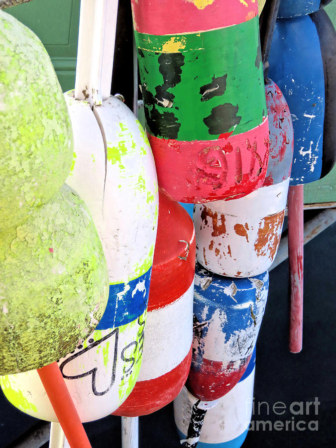 Buoys in vibrant colors Photograph by Janice Drew