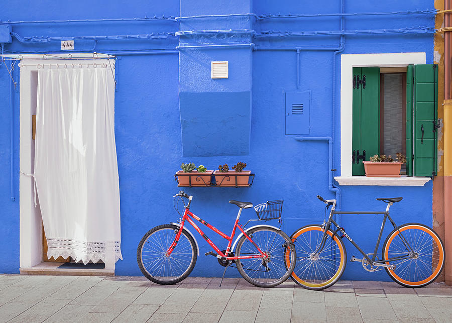 Burano Blue And Two Bicycles Photograph by Elvira Peretsman