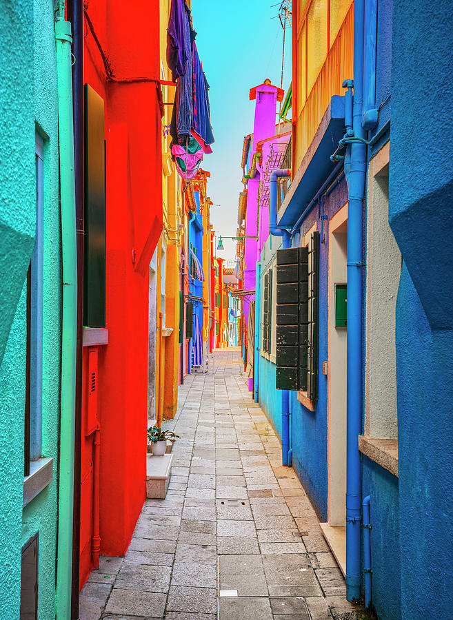 Burano island, narrow street and colorful houses. Venice Photograph by Stefano Orazzini
