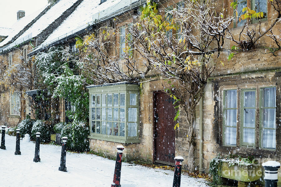 Burford High Street Cottages in the December Snow Photograph by Tim Gainey
