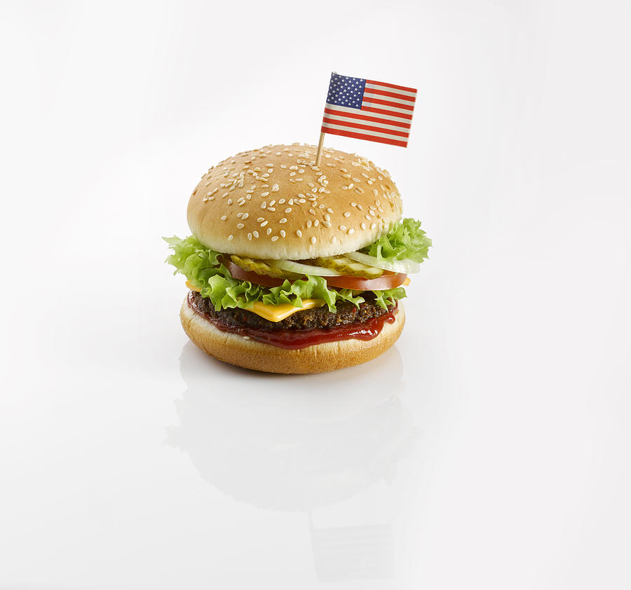 Burger with American flag Photograph by Westend61