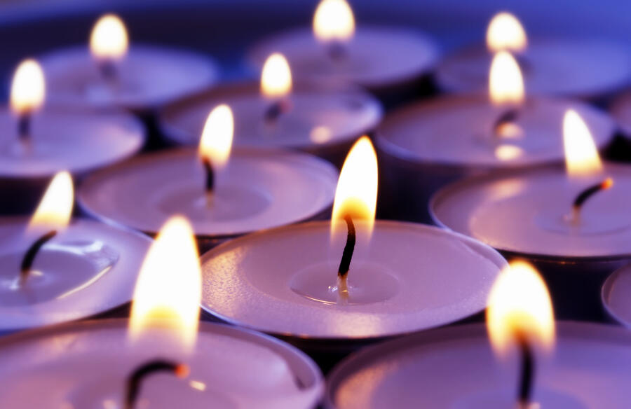Burning violett candles background Photograph by Deepblue4you