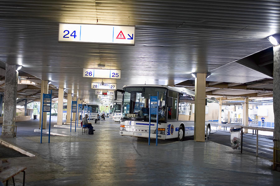 Buses in a bus station, Nice, France Photograph by Glowimages