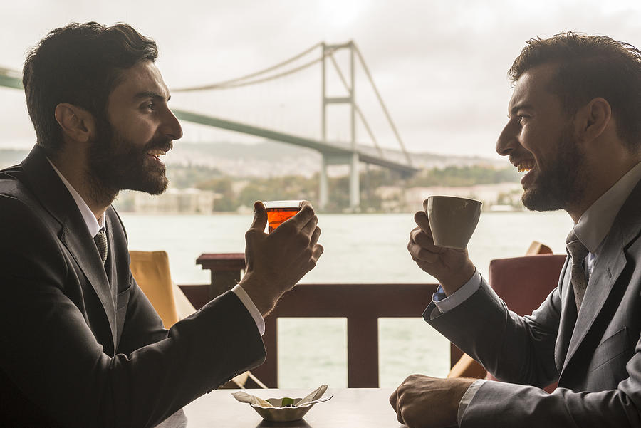 Business meeting at the Bosphorous Bridge, Istanbul. Photograph by JohnnyGreig