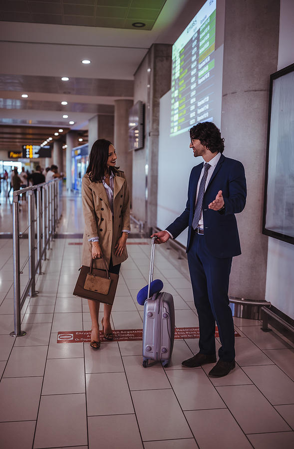 Business people meeting for welcome greeting at international airport Photograph by Wundervisuals