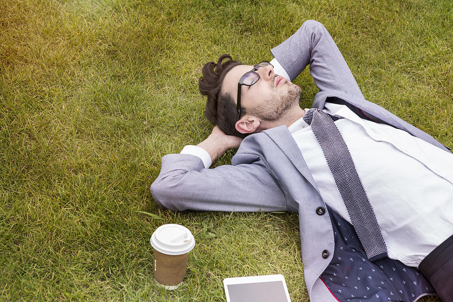 Business Person Having Break, Laying In Park. Photograph by Betsie Van Der Meer