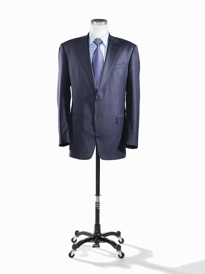 Business suit on a tailors mannequin Photograph by Ryan McVay