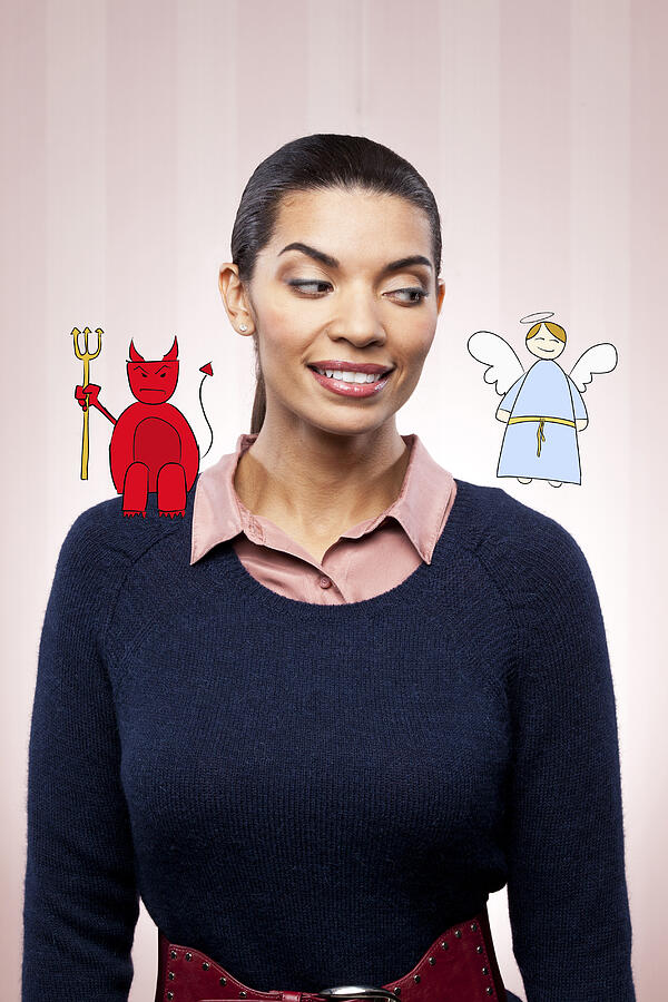 Business woman with angel and devil on shoulder Photograph by William Andrew