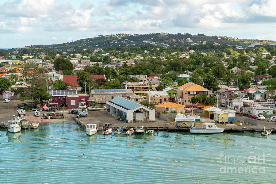 Businesses and dwellings in the harbor area of St Johns, Antigua Photograph by William Kuta
