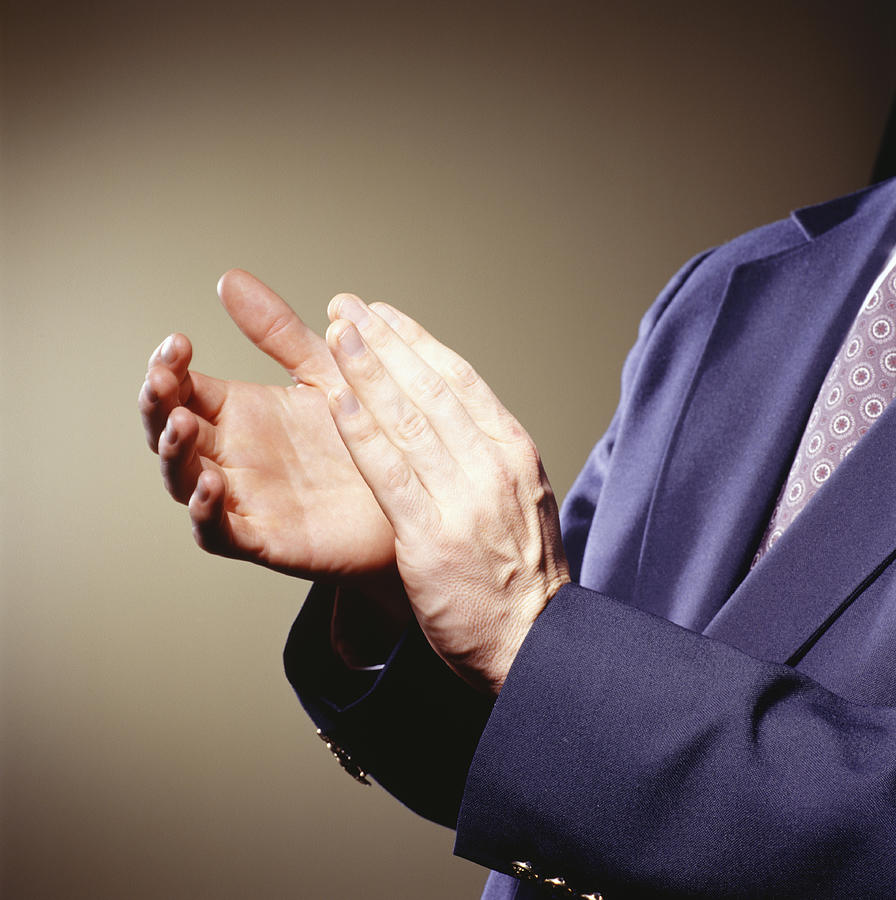 Businessman clapping, Close-up of hands Photograph by Photodisc