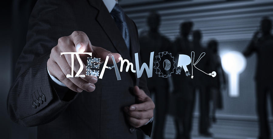 businessman hand drawing design graphic word TEAMWORK as concept Photograph by Everythingpossible