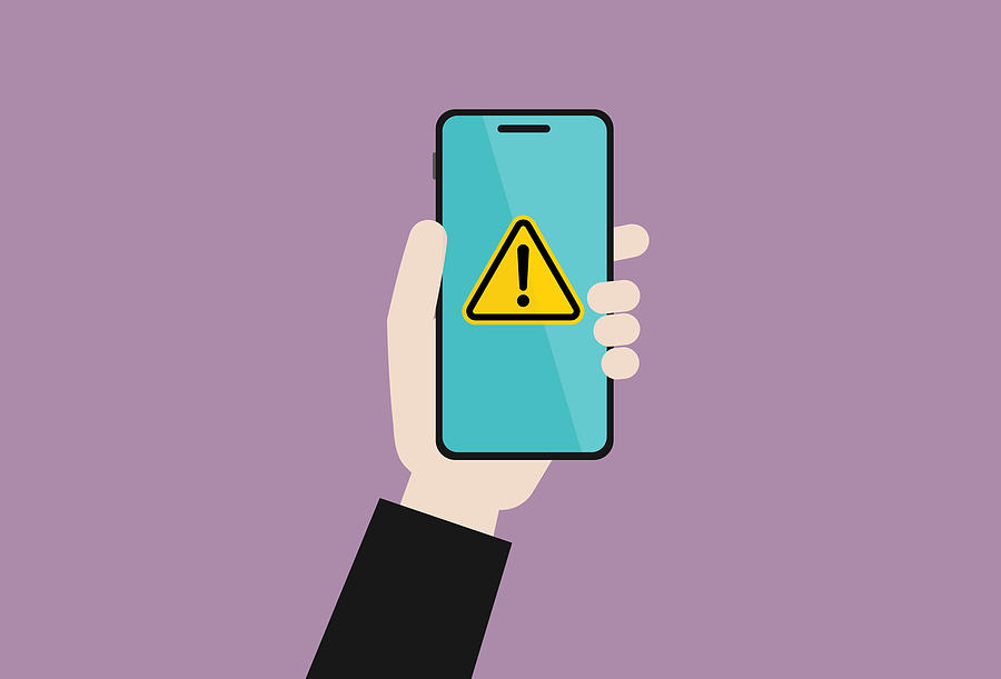 Businessman holds a mobile phone with a warning sign Drawing by Tommy