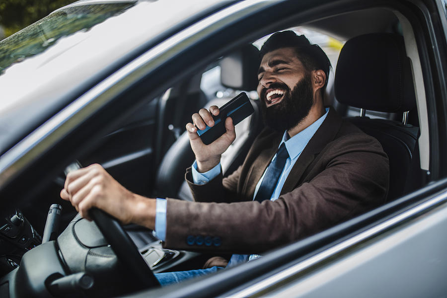 Businessman in car Photograph by Obradovic