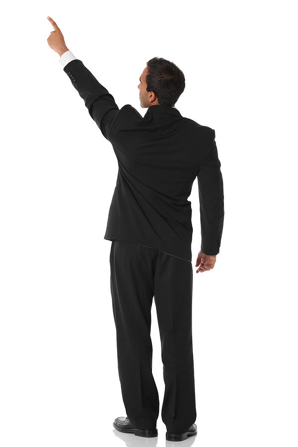 Businessman pointing rear view Photograph by 4x6