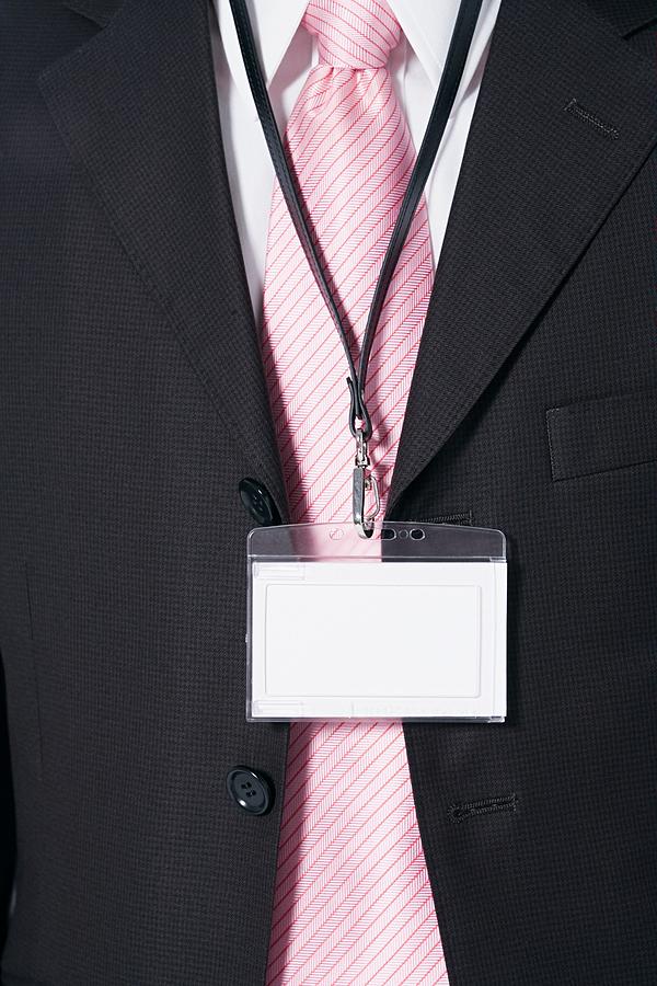 Businessman wearing a security pass Photograph by Image Source