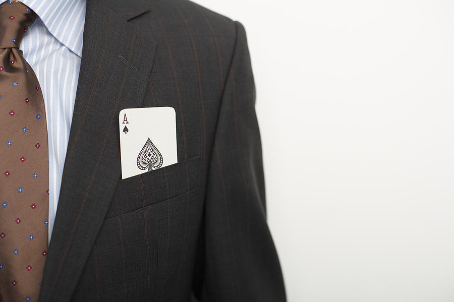 Businessman with an ace in pocket Photograph by Stock4b-rf