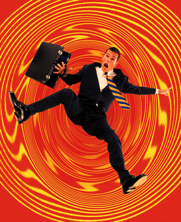 Businessman with briefcase falling into whirlpool (Digital Composite) Photograph by John Eder