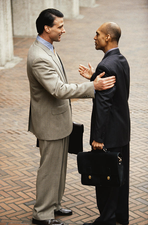 Businessmen in Conversation Photograph by Keith Brofsky