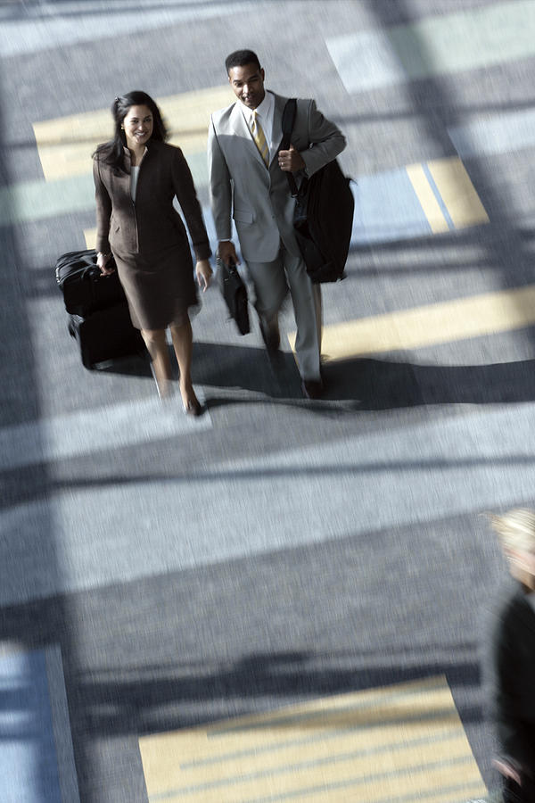 Businesspeople walking Photograph by Comstock Images