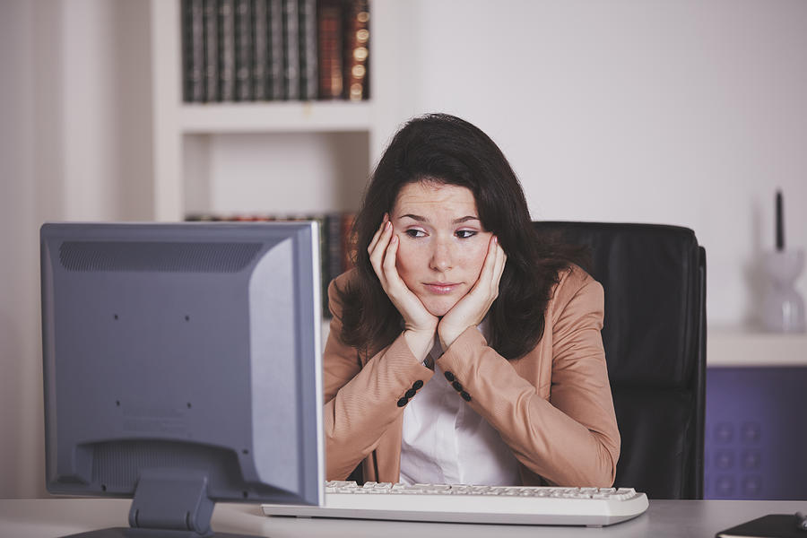 Businesswoman at the office Photograph by Nphotos Businesswoman at the office Photograph by Nphotos