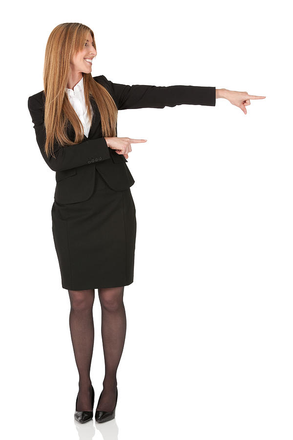 Businesswoman pointing sideways Photograph by 4x6