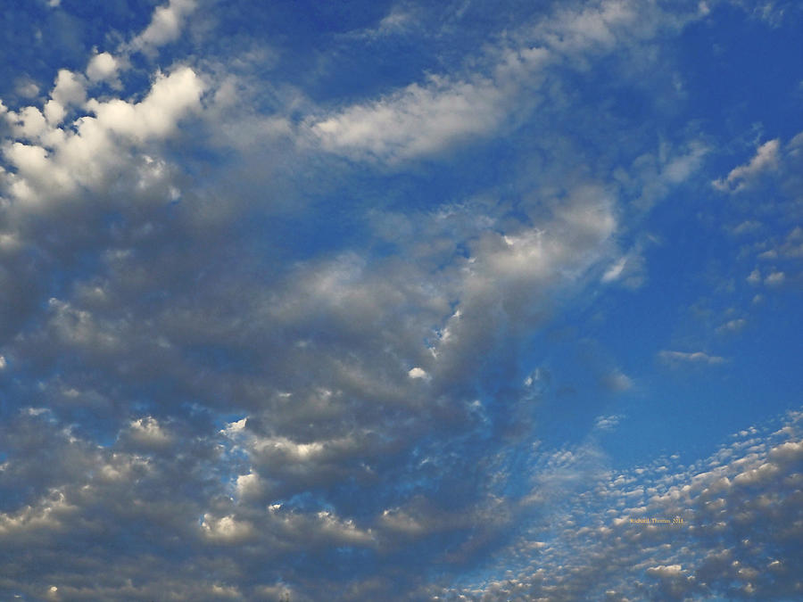 Buttermilk Clouds Photograph by Richard Thomas
