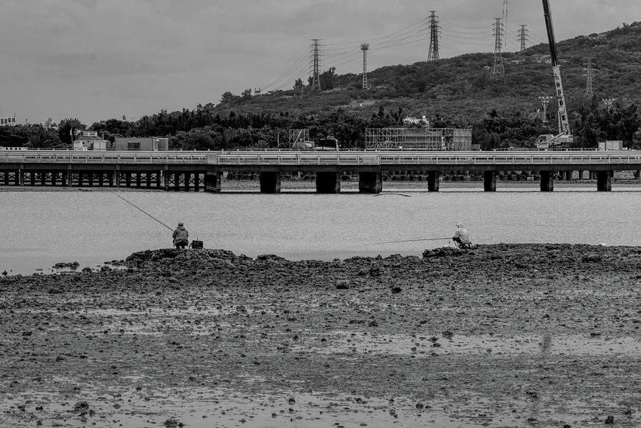 BW- Fishing at Low Tide Photograph by Eric Hafner