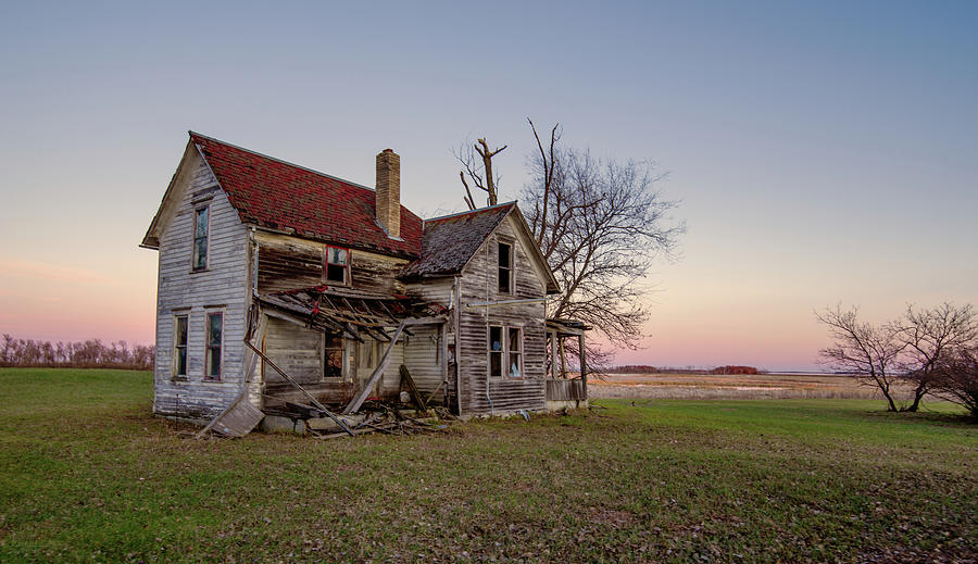 Bygone -  Sunset on an abandoned ND Farm homestead Photograph by Peter Herman