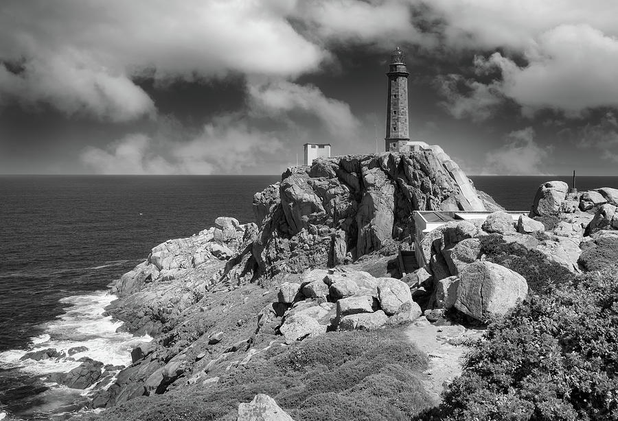 Cabo Vilan Lighthouse in black and white Photograph by Jordi Carrio Jamila