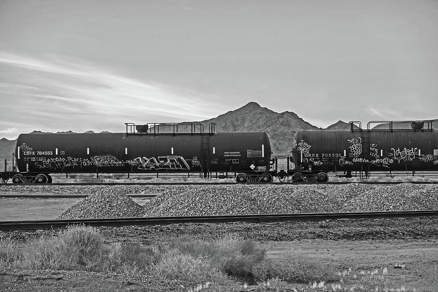 California Desert Graffiti trains in Rice California at Sunset Black and White Photograph by Toby McGuire